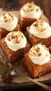 Closeup moist carrot cake adorned with cream cheese frosting.