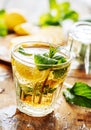 Closeup of mojito drink glass and  ingredients on vintage wooden table Royalty Free Stock Photo