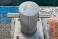 Closeup of a mooring bollard on a jetty