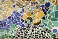 Closeup of mosaic of colored ceramic tile by Antoni Gaudi at his Parc Guell, Barcelona, Spain Royalty Free Stock Photo