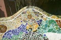 Closeup of mosaic of colored ceramic tile by Antoni Gaudi at his Parc Guell, Barcelona, Spain Royalty Free Stock Photo