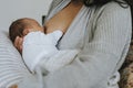 Closeup mother breastfeeding her baby