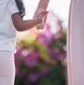 Closeup mother and daughter holding hands while walking outside in the garden. A great role model and mentor for her Royalty Free Stock Photo