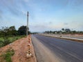 Motion blurred vehicle moving in the national highway roads of india