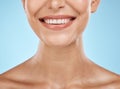Closeup, mouth and woman with skincare, cosmetics and dermatology with girl on blue studio background. Face, female and