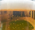 Closeup mug of beer background. Yellow beer with bubble Royalty Free Stock Photo
