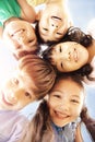 Multi-ethnic group of schoolchildren face