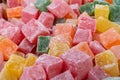 Closeup of multicolored cubes Turkish delight (Lokum). Selective Focus. Flat lay Royalty Free Stock Photo