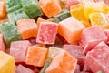 Closeup of multicolored cubes Turkish delight (Lokum). Selective Focus. Flat lay Royalty Free Stock Photo