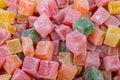 Closeup of multicolored cubes Turkish delight (Lokum). Selective Focus. Flat lay Royalty Free Stock Photo