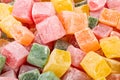 Closeup of multicolored cubes Turkish delight (Lokum). Selective Focus. Flat lay Royalty Free Stock Photo