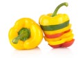 Closeup of multicolored slices of bell pepper on white with drops of water