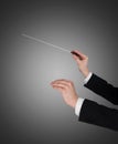 Closeup Of Music Conductor`s Hands Holding Baton Royalty Free Stock Photo