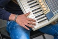 Closeup of musician hand playing an accordion Royalty Free Stock Photo