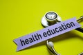 Closeup My health with stethoscope concept inspiration on yellow backgroundCloseup health education with stethoscope concept inspi Royalty Free Stock Photo