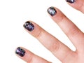 Closeup nail kids painted isolated on white