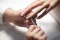 Nail Technician Making Manicure Cutting Cuticle At Beauty Salon, Closeup