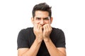 Closeup Of Nervous Young Man Biting Finger Nails Royalty Free Stock Photo