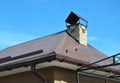 Closeup on new house rain gutter system and roof protection from snow board on house roofing Royalty Free Stock Photo