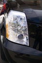 Closeup of new projector headlight on the car Royalty Free Stock Photo