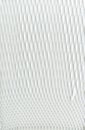 Textureof white packaging synthetic mesh white on black background. Nylon white macro texture pattern background. Royalty Free Stock Photo