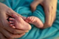 Parent holding hands feet. Newborn baby ankle Royalty Free Stock Photo