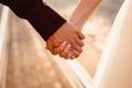 Closeup of newlyweds hands holding each other hands Royalty Free Stock Photo