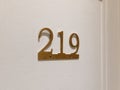 Closeup number on door room interior