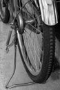 Closeup old bicycle wheel in black and white background Royalty Free Stock Photo
