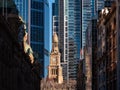 Closeup of an old building in the middle of tall business buildings in downtown Sydney Royalty Free Stock Photo