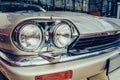 Closeup of old car with silver colored paint on automobile show. Royalty Free Stock Photo