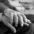 Old man and woman and text happy grandparents day Royalty Free Stock Photo