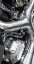 Closeup of an old classic retro style motorbike with full shiny chrome finish. Detail view of the engine and frame on an Royalty Free Stock Photo