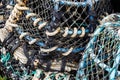 Closeup of old colorful mooring ropes and fishing gear