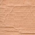 Closeup old crumpled grunge brown paper texture background.Brown paper sheet board with space for text ,pattern or abstract vintag Royalty Free Stock Photo