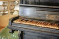 Closeup of old damaged antique piano keyboard