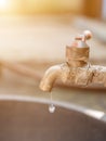 Closeup old faucet with water leaking Royalty Free Stock Photo