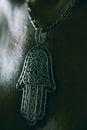 Old hamsa amulet or hand of Fatima