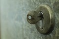 Closeup of an old keyhole with key Royalty Free Stock Photo