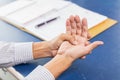 Closeup old man hand palm joint tendon muscle pain Royalty Free Stock Photo