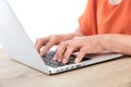 Closeup old man`s hands typing enter on laptop keyboard Royalty Free Stock Photo