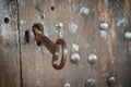 Closeup of old massive metal key in church ancient door Royalty Free Stock Photo