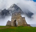 closeup old medieval castle in misty mountain Royalty Free Stock Photo