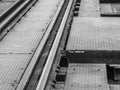 Closeup of an old railway track on steel bridge
