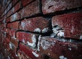 Closeup of an old red brick wall with a blurry background - perfect for textures and backgrounds Royalty Free Stock Photo