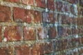 Closeup of an old red brick wall, copy space on a home exterior, house, or city building. Texture and detail background Royalty Free Stock Photo