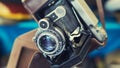 Closeup of old retro vintage film photo camera with lens Royalty Free Stock Photo