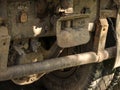 Closeup of old rusty and dirty truck back, large tire and tow me Royalty Free Stock Photo