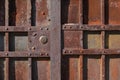 Closeup of old rusty metal lock and keyhole on a old iron door as a beautiful vintage background. Fragment of old rusty Royalty Free Stock Photo