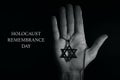 Star of david and text holocaust remembrance day